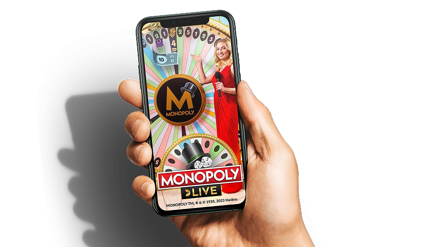 Monopoly mobil versiyasi — qo'lda smartfon ekranida Monopoly Live
